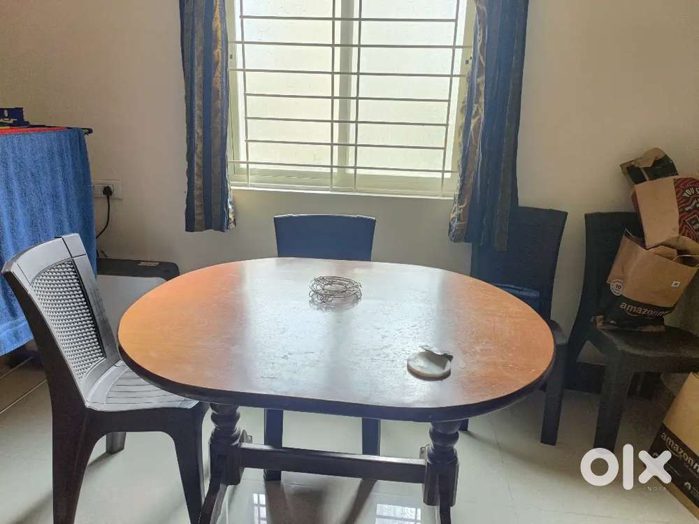 Dinner table and chairs, cupboard, washing machine