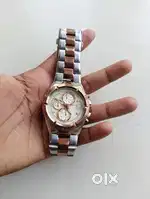 Titan watch glass broken and cell empty