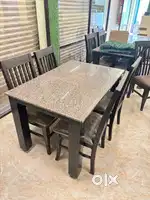 Dining table with Granite top and wooden chairs