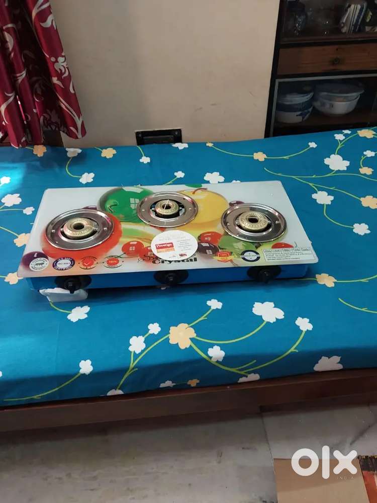 One three burner gas oven in totally new condition