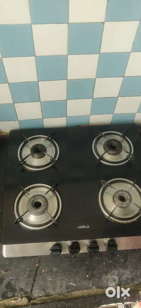 Beautiful 4 BURNER ELICA almost new NEGOTIABLE