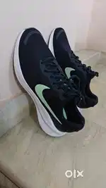 Nike Revolution Sports Shoes