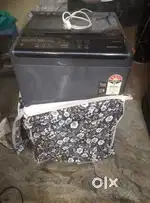 Whirlpool 7.5 kg washing machine with cover in working condition