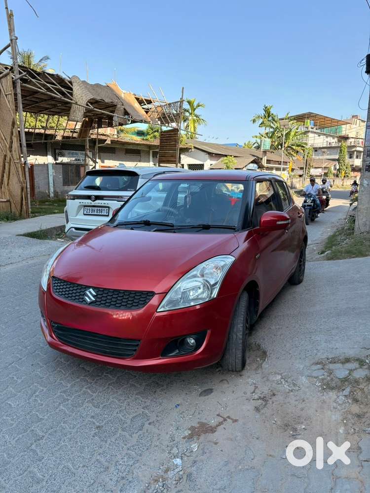 Swift VXI 2013 model, petrol with new tyres, infotainment and camera