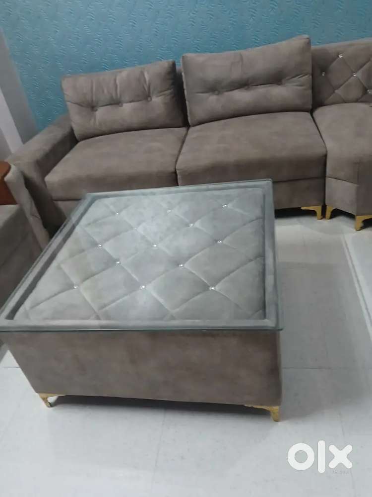 L shape sofa with couch and centre table worth rs55000