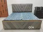Double bed in grey colour