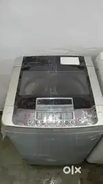 LG washing machine fully automatic top load with warranty and good con
