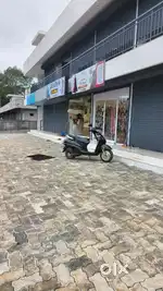 20 cents land for Rs.12 lakhs per cent and 9 shops rent Rs. 7500/room
