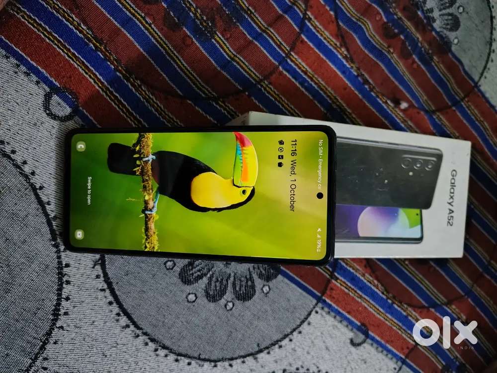 Samsung A52 8gb/128gb ladies hand used.