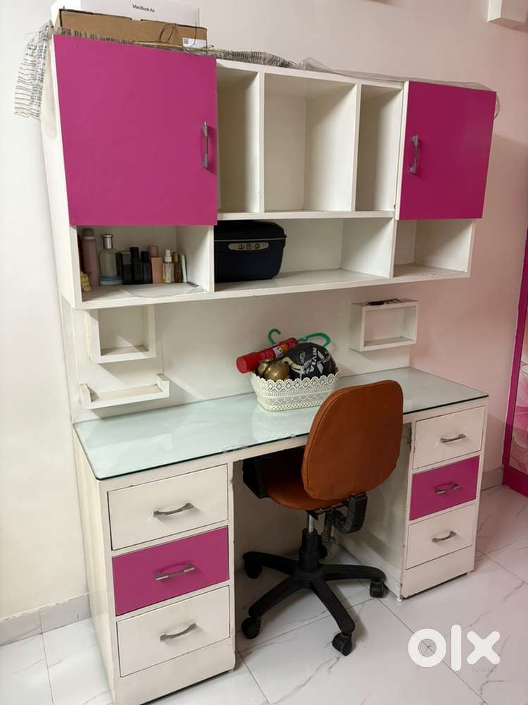Study table with chair and single bed for a teen girl