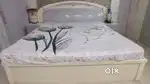 King size bed with wardrobe and side tables