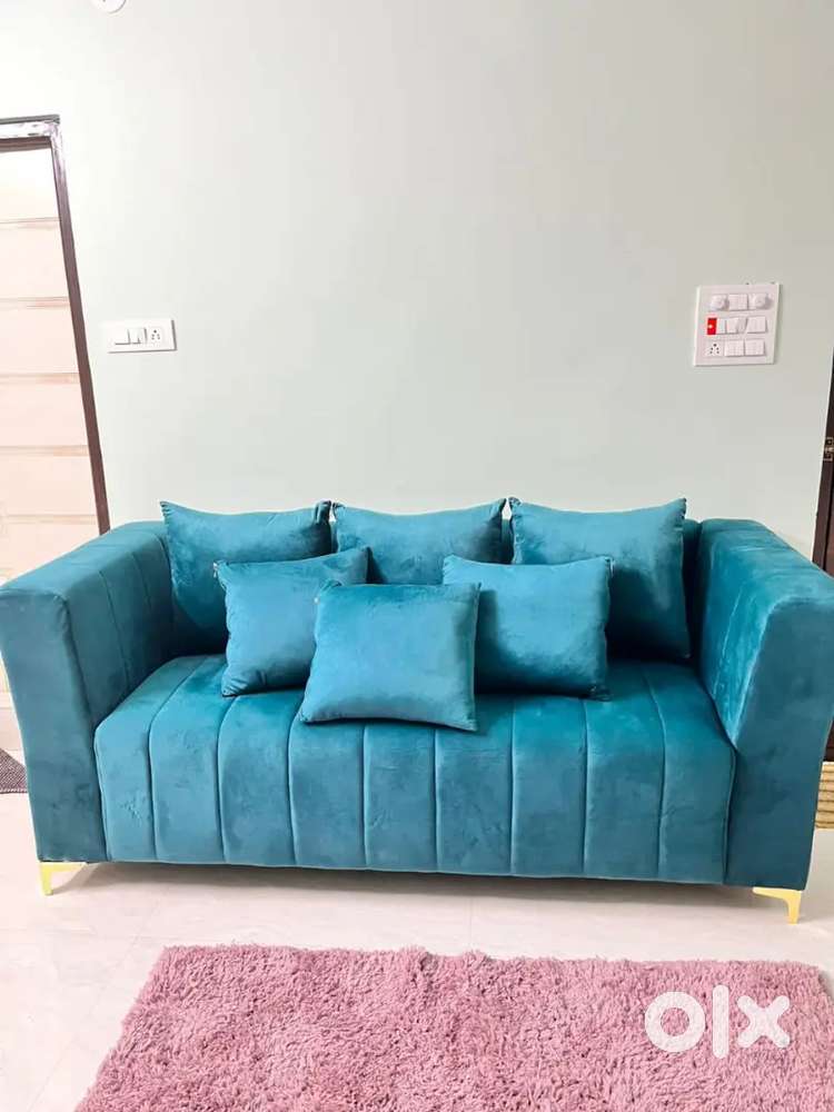 Full back 3 seater sofa with pillows available in Starf Furniture