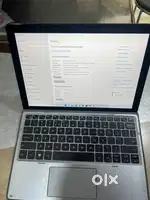 Dell 7210 2 in One laptop