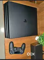 PS4 Pro console black 1TB + 1Ds4 very less used
