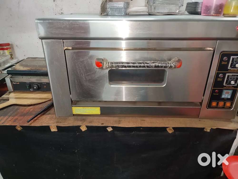 Gas Ovan Sandwich griller.  Deep freez table &chair