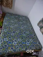 Cot of size 6×4 with mattress.