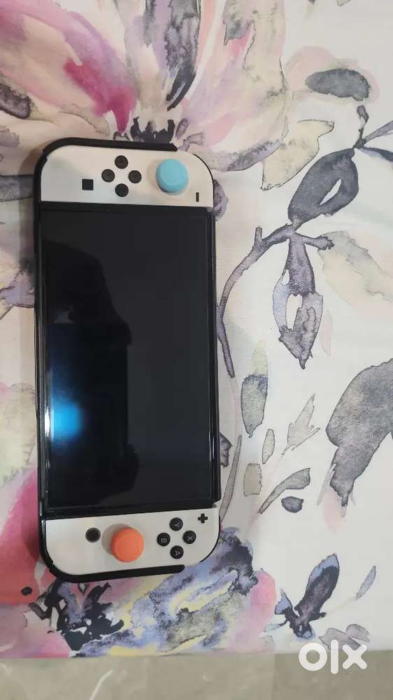 Nintendo Switch Oled with accessories