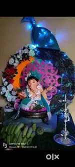 Home Ganesh murti background decoration