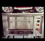 Mast condition oven hi gas electric dono hi 1 month use hua hi