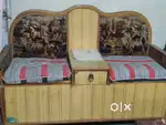 Two seater wooden sofa with wide space inside for storage