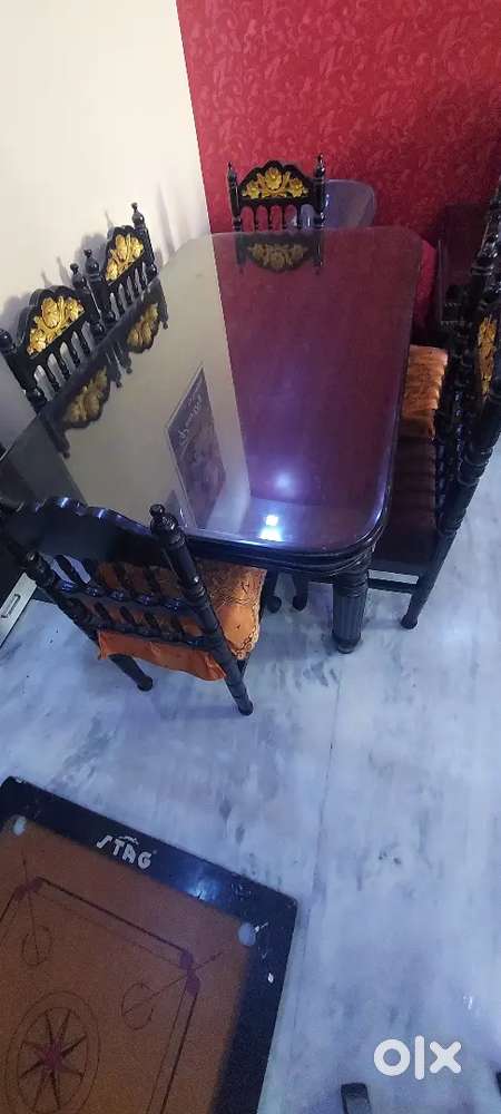 Dining table. 6 chairs. Sagwan wood. Tuffen glass.