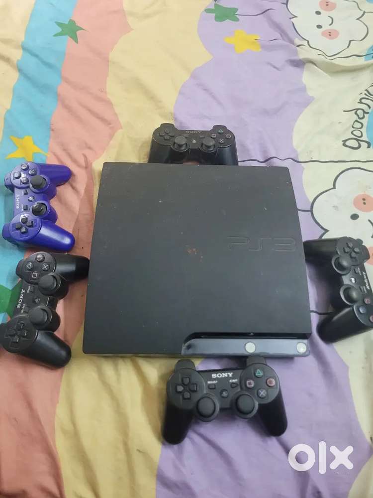 PS3 500 gb for sale with 23 game CDz and 5 joysticks
