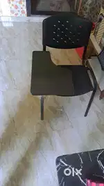 Study chair with writing pad