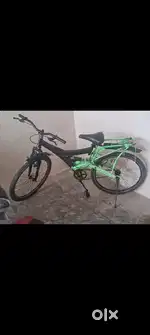 A cycle with good condition good tyres n good breaks with suspension.,