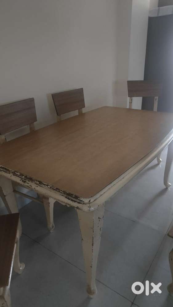 Wooden dining table available with 6 wooden chairs at 10000 only