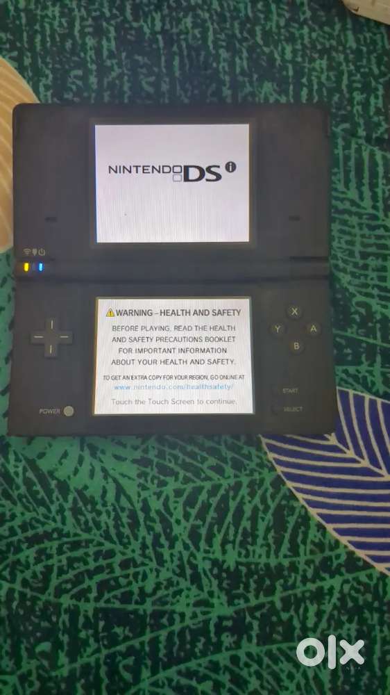 Nintendo dsi with Original box and manuals and all accessories