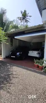 1 Acre PWD Road East facing plot,1600 sqft House and Rubber plantation