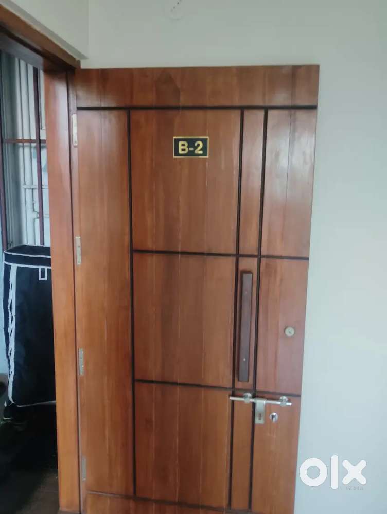 2BHK semi furnished flat on second floor with dedicated parking