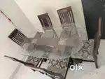 A Dinning Table, A Sofa Set , A Living Room Table At StealDeal Price .