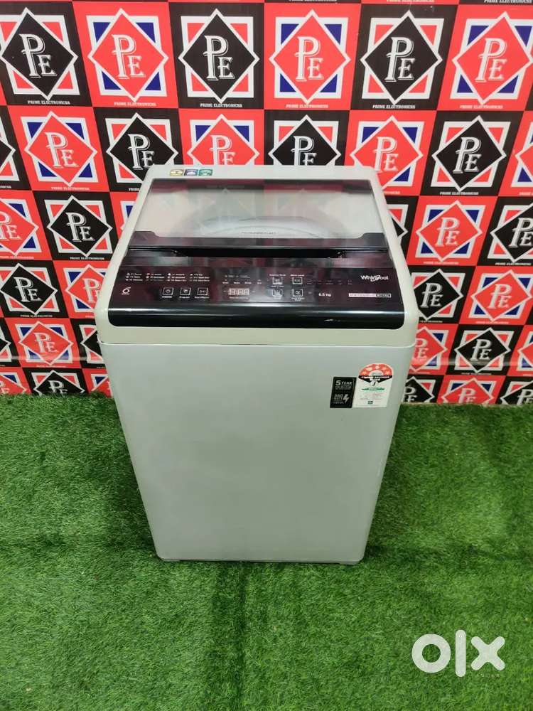 - Top loading machine black and grey colour 6.5 kg in great condition