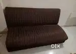 Single cushioned sofa