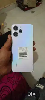 Redmi 12 6gb 128gb intarnal bil box charger available spekar Daimeg
