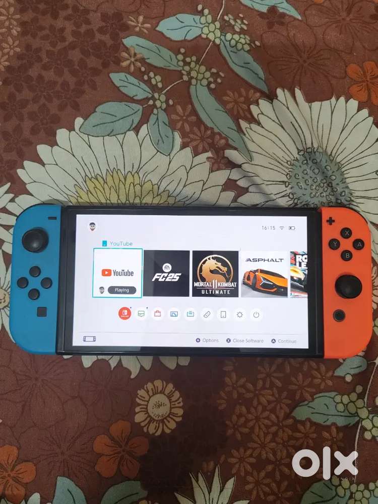 NINTENDO OLED Working condition and fc 25 with all accessories