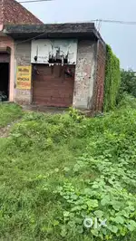 185 gaj 14 foot matha main Sultanwind Road ta ek Dukaan or ek plot