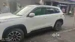 This is a grand vitara alpha smart hybrid