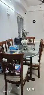 Dinning table for Sale with extra chair cover