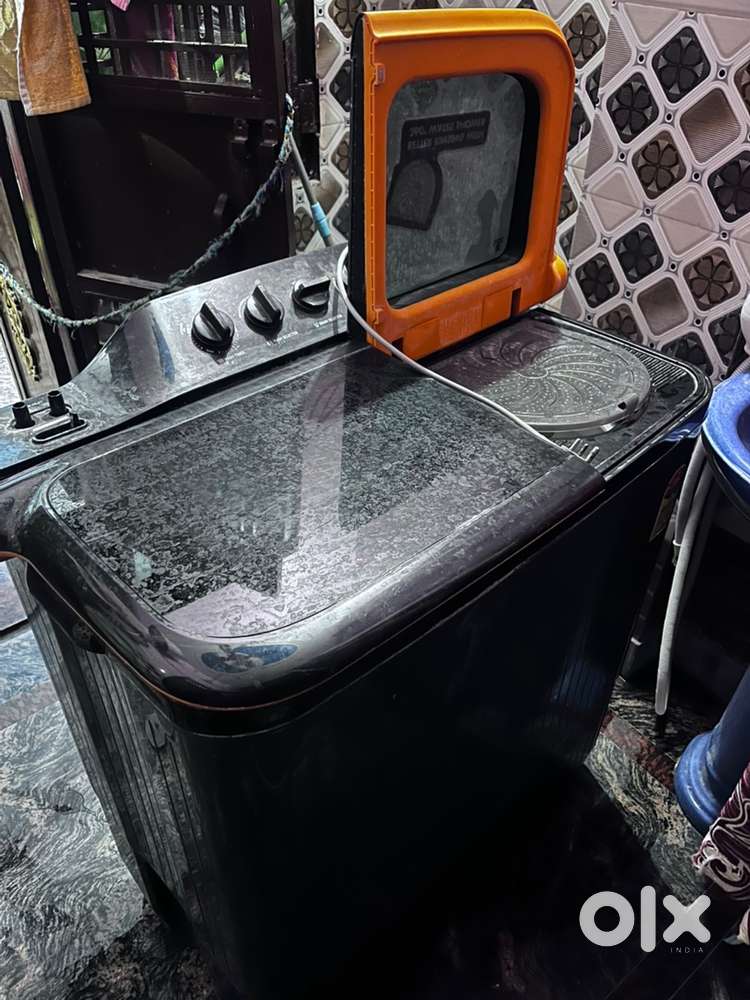 Semi automatic llyod wasing machin 14 months warranty remaining