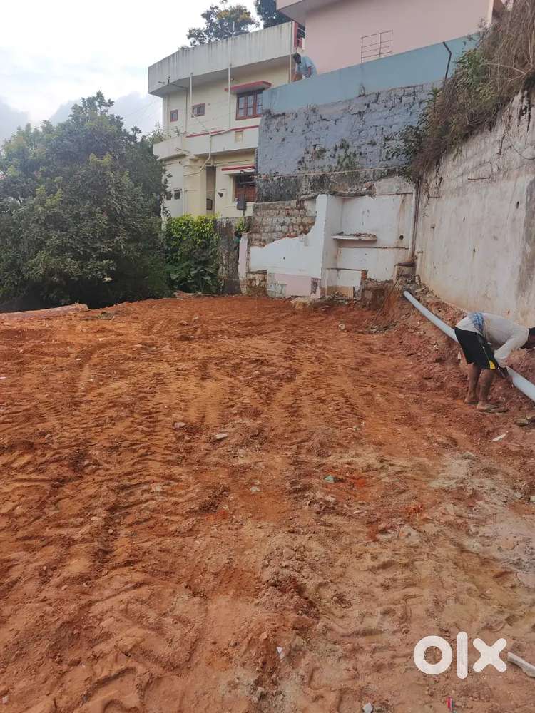 Vacate house site for sale in madikeri