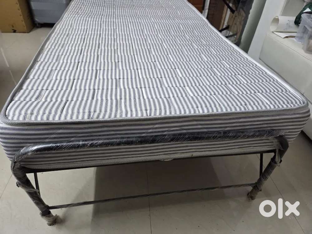 Springtech folding bed with mattress