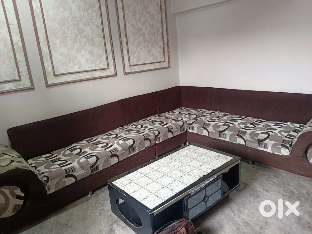 CORNER SOFA WITH TEA TABLE