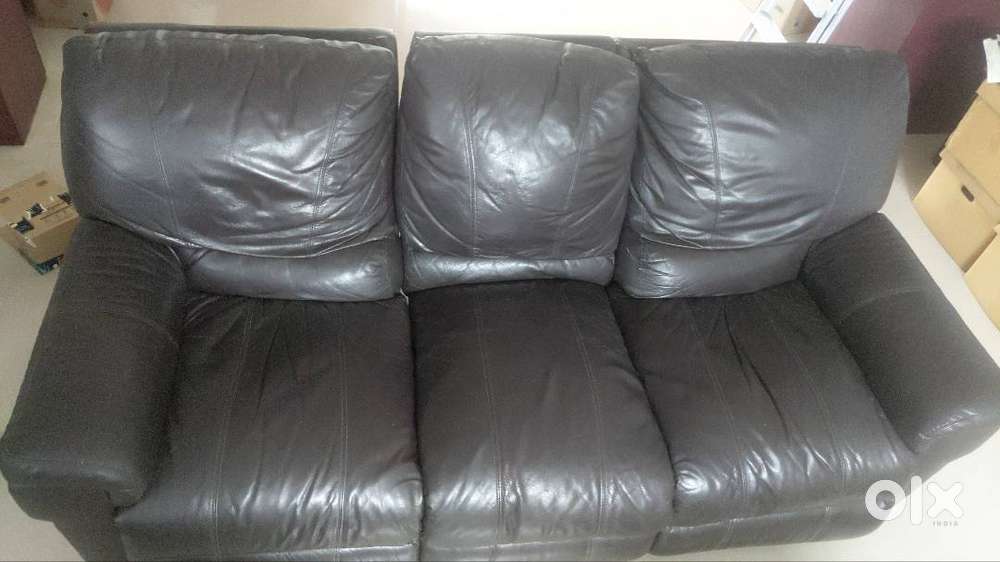 3-seater leatherette sofa having reclining ends