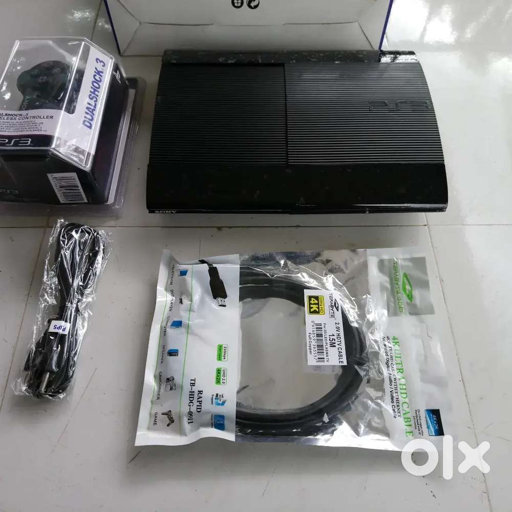 500gbPS3 super slim refurbished condition with 35 games with warranty