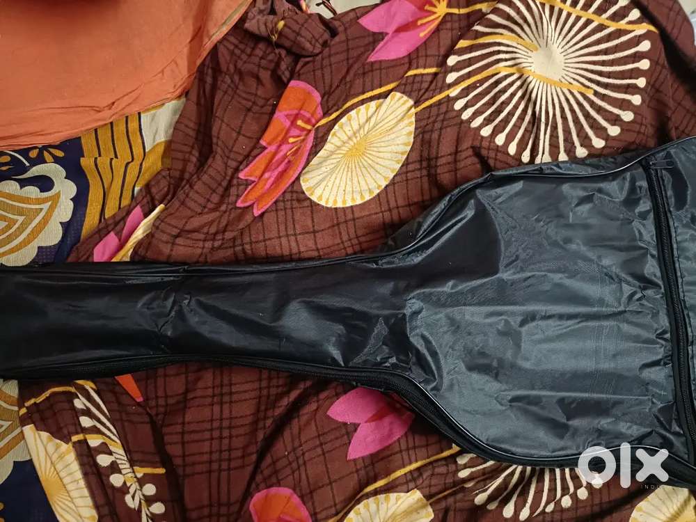 Good condition new guitar revel one month ka hie