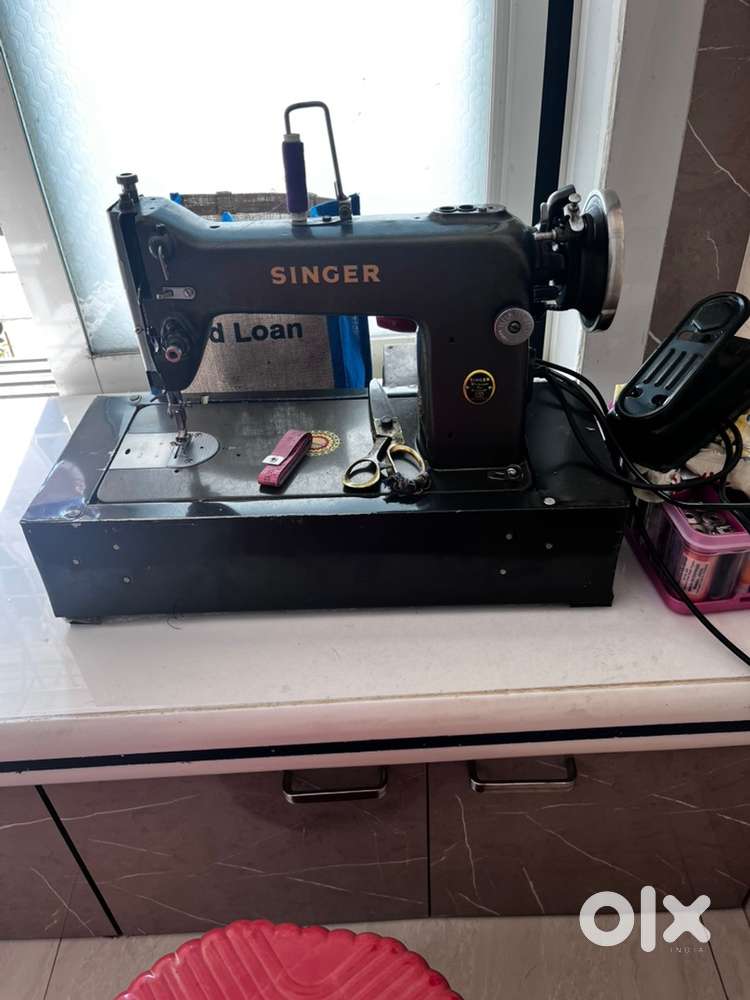 Singer machine full shuttel