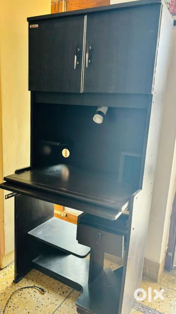 Computer table with storage cabinet
and drawer
