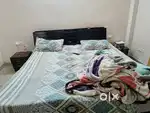Bed with side table